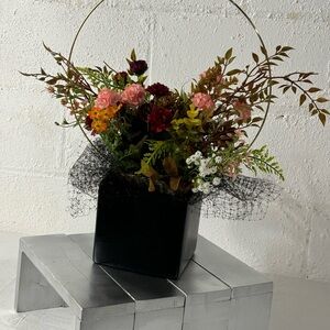 Flowers in black pot